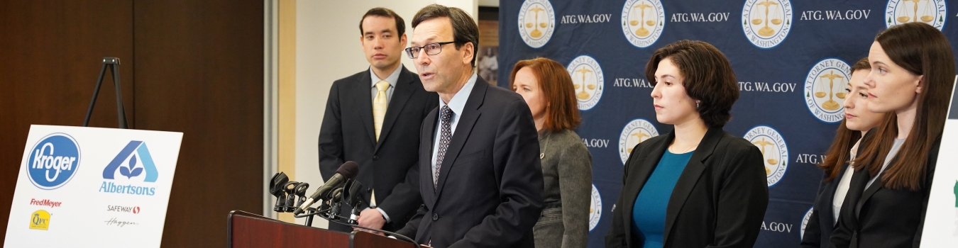 AG Ferguson speaks at a podium